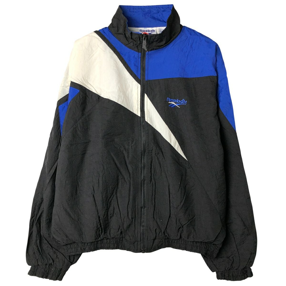 古着 90年代 リーボック Reebok 総柄 ナイロンジャケット メンズM相当