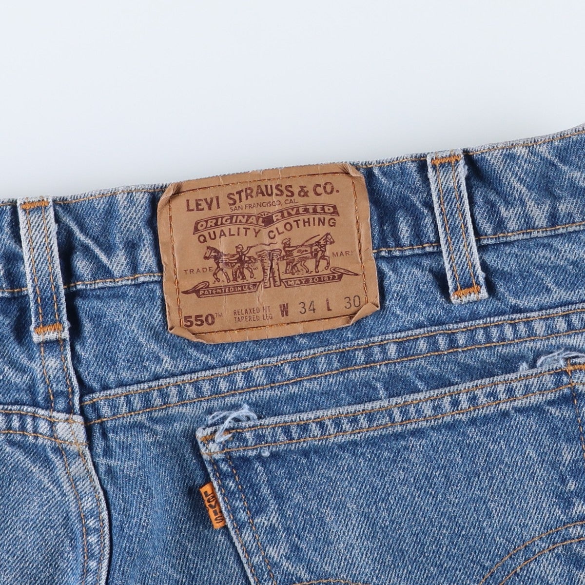 古着 90年代 リーバイス Levis 550 RELAXED FIT TAPERED LEG オレンジ
