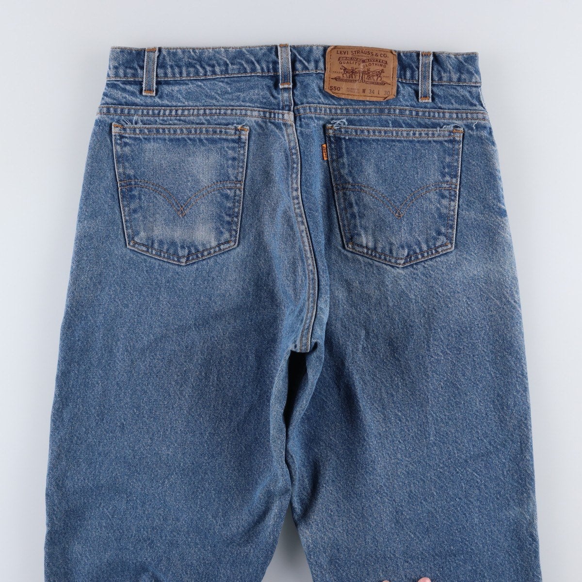 古着 90年代 リーバイス Levis 550 RELAXED FIT TAPERED LEG オレンジ